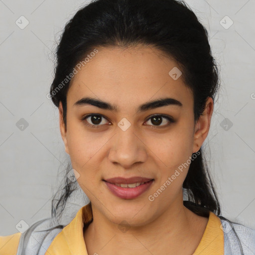 Joyful latino young-adult female with medium  black hair and brown eyes