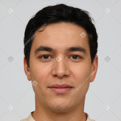 Joyful white young-adult male with short  black hair and brown eyes