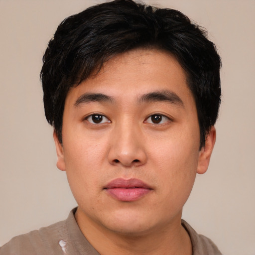 Neutral asian young-adult male with short  black hair and brown eyes