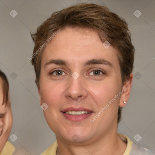 Joyful white young-adult female with short  brown hair and grey eyes