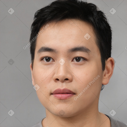 Neutral asian young-adult male with short  black hair and brown eyes