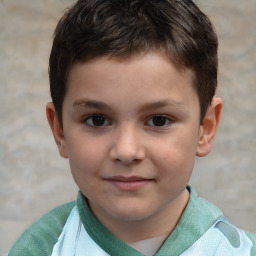 Joyful white child male with short  brown hair and brown eyes