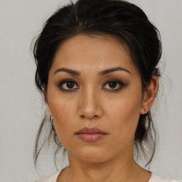 Neutral asian young-adult female with medium  brown hair and brown eyes