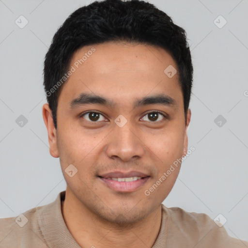 Joyful latino young-adult male with short  black hair and brown eyes