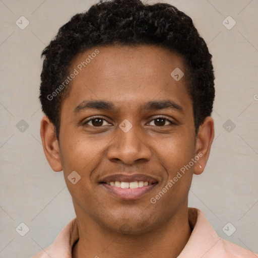 Joyful latino young-adult male with short  brown hair and brown eyes