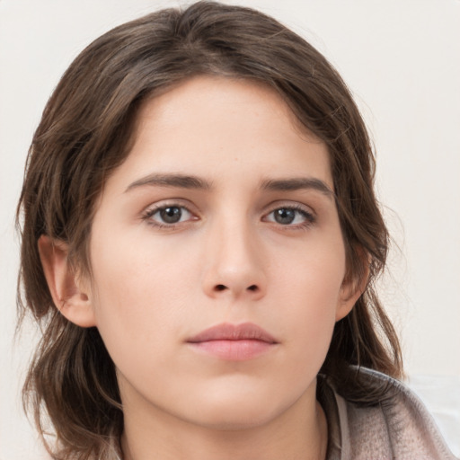 Neutral white young-adult female with medium  brown hair and brown eyes