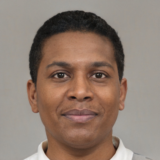 Neutral black young-adult male with short  brown hair and brown eyes