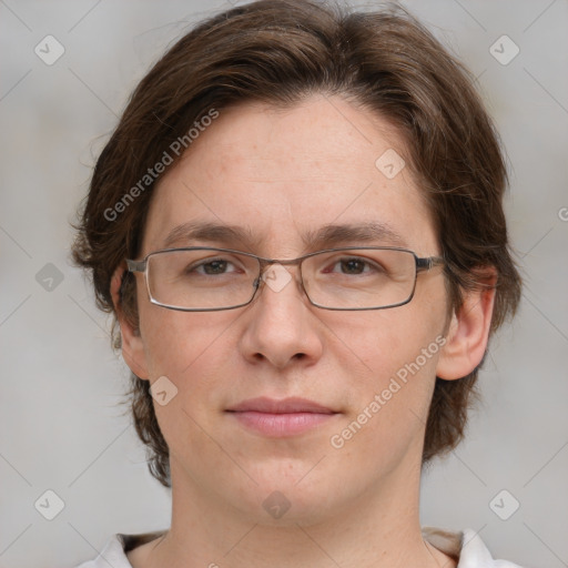 Joyful white adult female with medium  brown hair and grey eyes