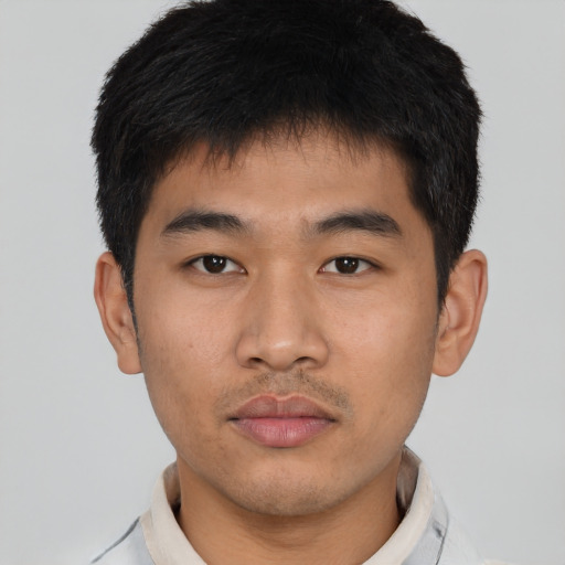 Neutral asian young-adult male with short  brown hair and brown eyes