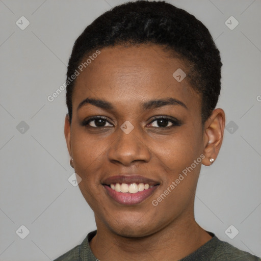 Joyful black young-adult female with short  black hair and brown eyes