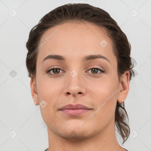 Neutral white young-adult female with short  brown hair and brown eyes