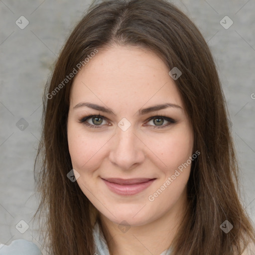 Joyful white young-adult female with long  brown hair and green eyes