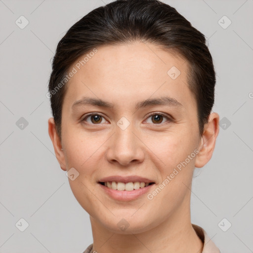 Joyful white young-adult female with short  brown hair and brown eyes