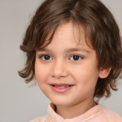 Joyful white child female with medium  brown hair and brown eyes