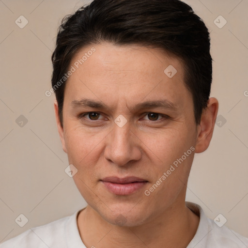 Joyful white adult male with short  brown hair and brown eyes