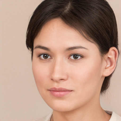 Neutral white young-adult female with medium  brown hair and brown eyes