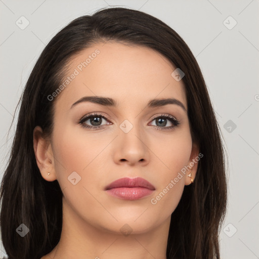 Neutral white young-adult female with long  brown hair and brown eyes