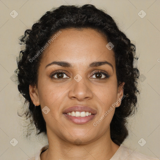 Joyful black young-adult female with medium  brown hair and brown eyes