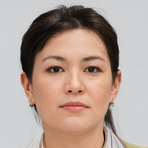 Neutral white young-adult female with medium  brown hair and brown eyes