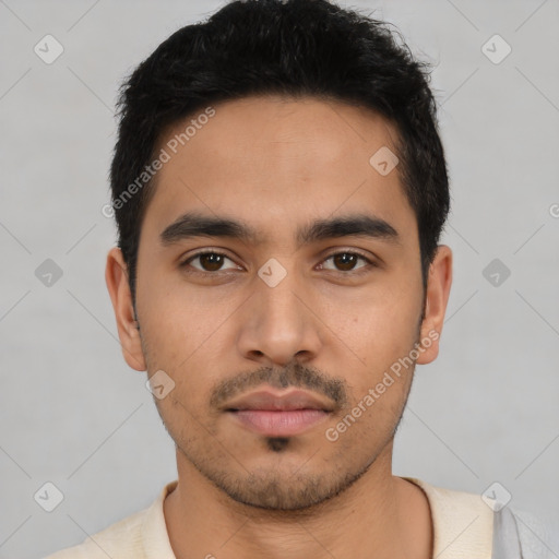 Neutral latino young-adult male with short  black hair and brown eyes