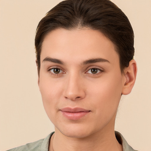 Neutral white young-adult female with short  brown hair and brown eyes