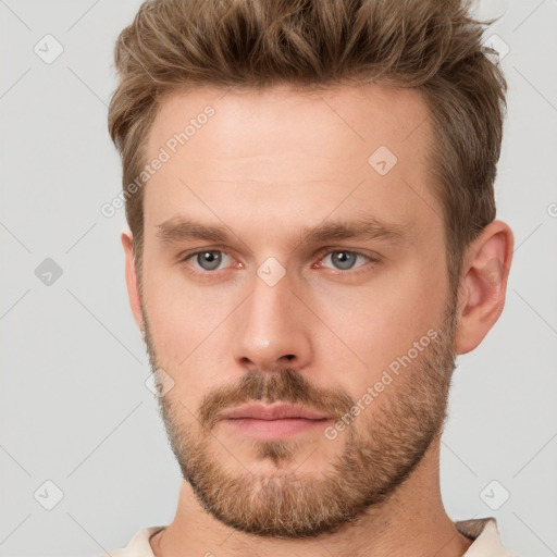 Neutral white young-adult male with short  brown hair and grey eyes