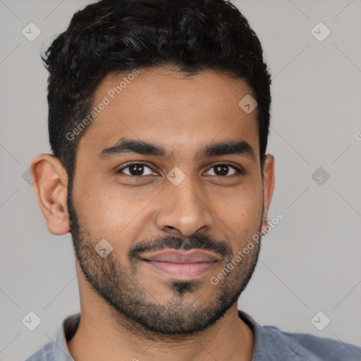 Joyful latino young-adult male with short  black hair and brown eyes