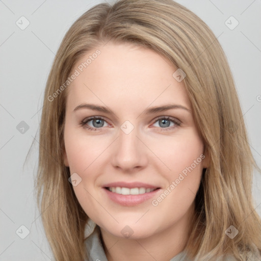 Joyful white young-adult female with long  brown hair and grey eyes