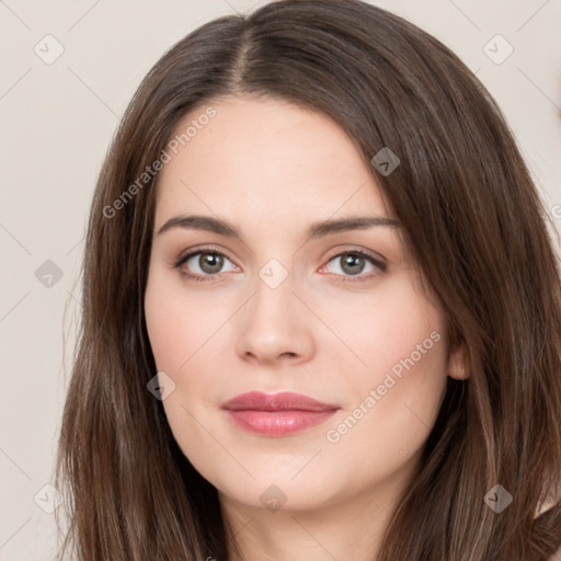 Neutral white young-adult female with long  brown hair and brown eyes