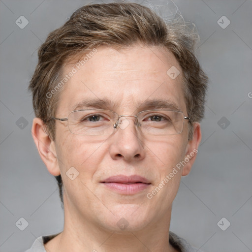 Joyful white adult male with short  brown hair and grey eyes