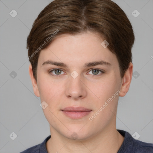 Joyful white young-adult female with short  brown hair and grey eyes