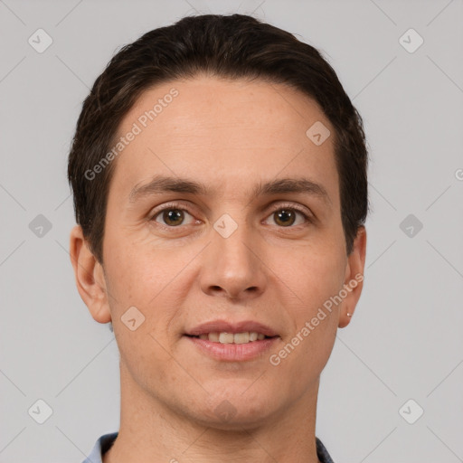 Joyful white adult male with short  brown hair and brown eyes