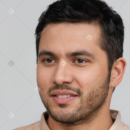 Joyful white young-adult male with short  black hair and brown eyes