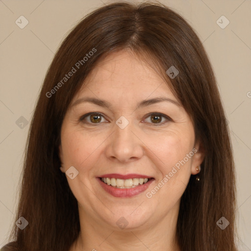 Joyful white adult female with long  brown hair and brown eyes