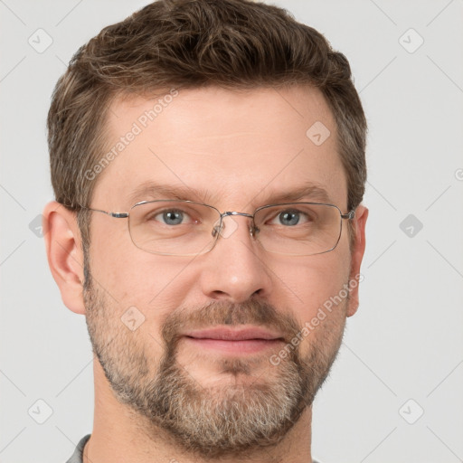 Joyful white adult male with short  brown hair and grey eyes