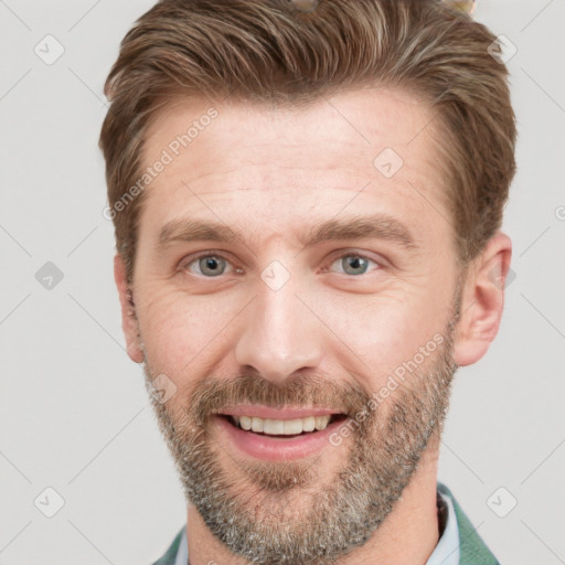 Joyful white adult male with short  brown hair and brown eyes