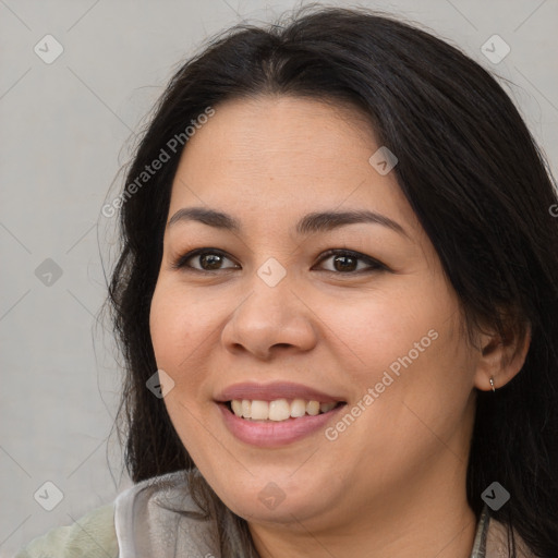 Joyful asian young-adult female with long  brown hair and brown eyes