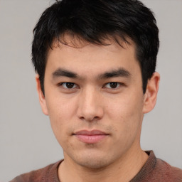 Neutral asian young-adult male with short  brown hair and brown eyes