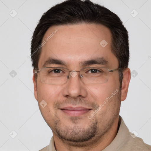 Joyful white adult male with short  brown hair and brown eyes