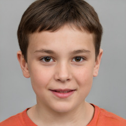 Joyful white child male with short  brown hair and brown eyes