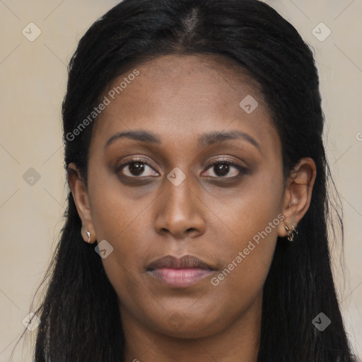 Neutral black young-adult female with long  brown hair and brown eyes