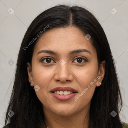 Joyful latino young-adult female with long  brown hair and brown eyes