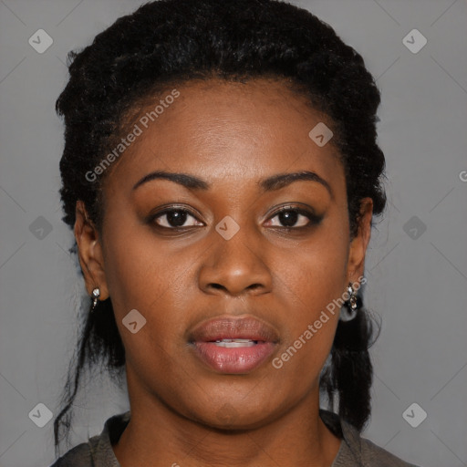 Joyful black young-adult female with medium  black hair and brown eyes