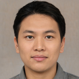 Neutral asian young-adult male with short  black hair and brown eyes