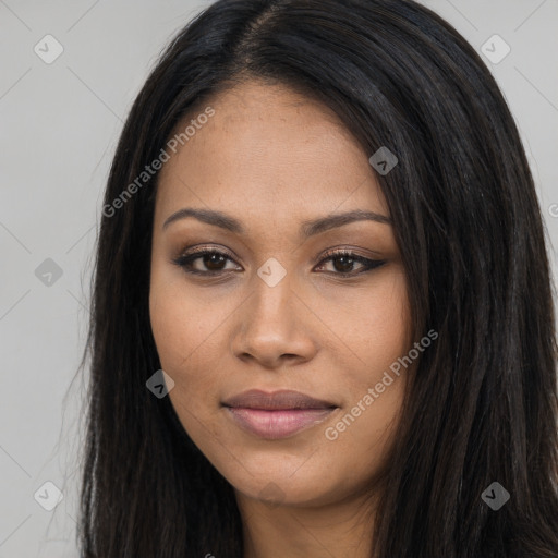 Joyful latino young-adult female with long  black hair and brown eyes