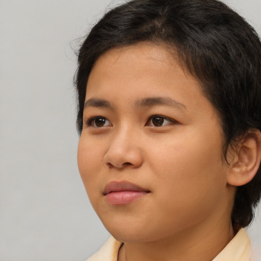 Neutral asian young-adult female with medium  brown hair and brown eyes