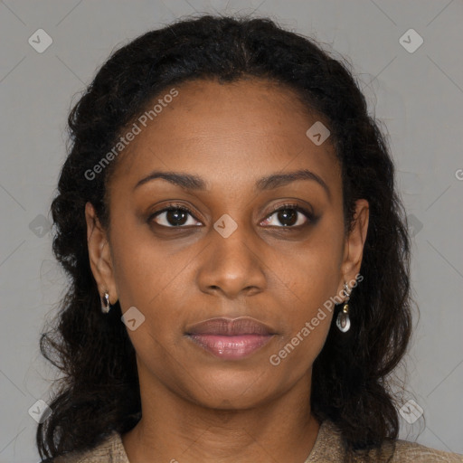 Joyful black young-adult female with long  brown hair and brown eyes