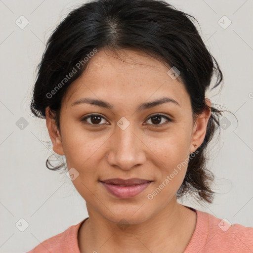 Joyful latino young-adult female with medium  brown hair and brown eyes