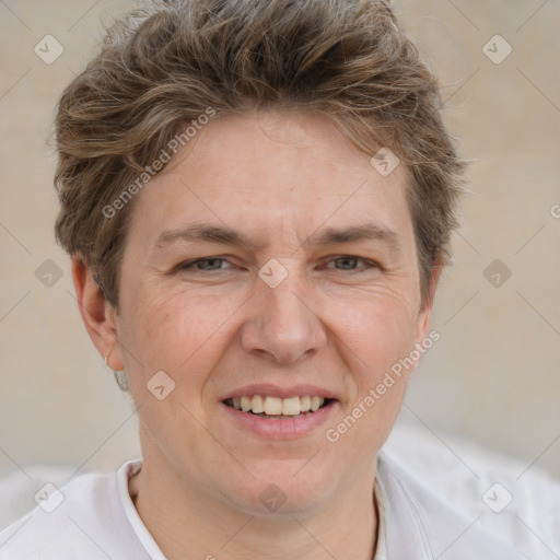 Joyful white adult female with short  brown hair and brown eyes