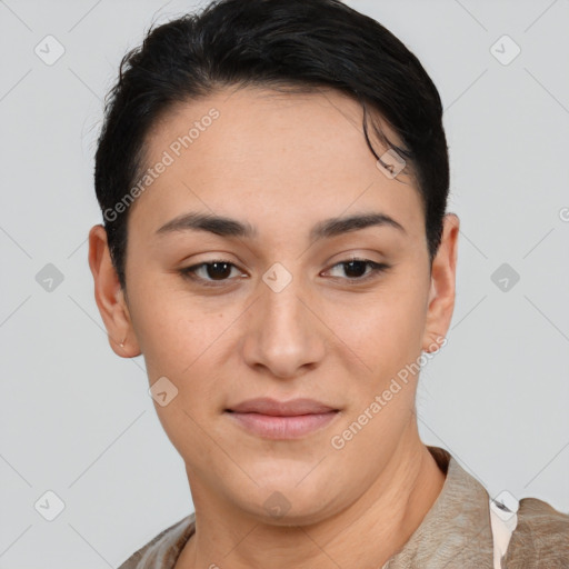 Joyful latino young-adult female with short  brown hair and brown eyes